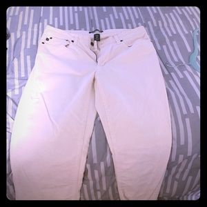 Boot cut cream colored cords.